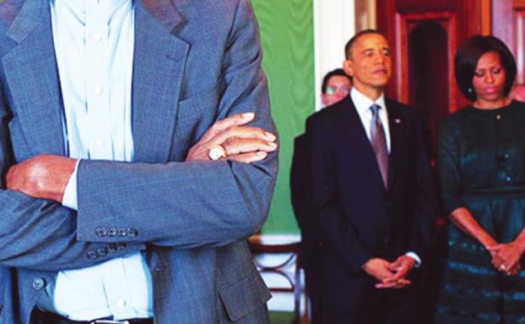 President Barack Obama and First Lady Michelle Obama wait in the Green Room of the White House with Sylvia Mendez and Bill Russell (left) as recipients of the 2010 Presidential Medal of Freedom are introduced in the East Room, Feb. 15, 2011. courtesy photo/file