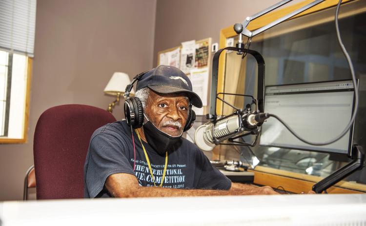 KKFI’s “Groovy” Grant Hopkins in the studio on May 10, 2023 for his final broadcast after telling his fans and listeners that failing health requires him to retire. photo/Raye Jackson