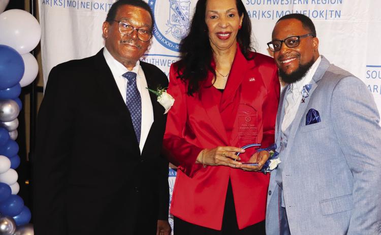 From left: Marion Jordon, Sr. and wife, Denise Jordon, owners of The Kansas City Globe newspaper receive the Business Award presented by Brandon Hill, Southwestern Regional Director of Phi Beta Sigma Fraternity. photo/George Barrett