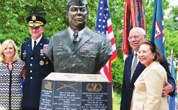 Former U.S. Secretary of State and former Chairman of the Joint Chiefs of Staff, retired Gen. Colin Powell (at right with wife, Alma), received a place of honor on the Circle of Firsts at the Buffalo Soldier Monument, in Fort Leavenworth, Kan. as his bust was unveiled. 2014 Archive photo/U.S. Army