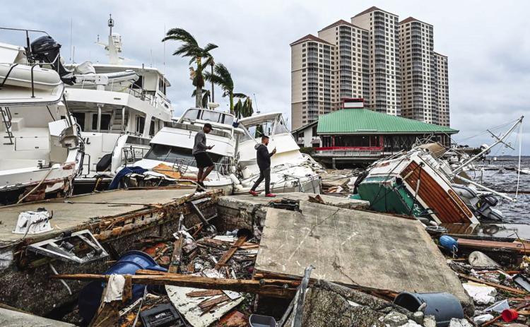 Boats are left stranded on the shore in the aftermath of Hurricane Ian in Fort Myers, Florida, on September 29, 2022. Georgio Viera/AFP via Getty Images