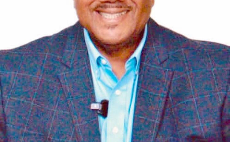 Myron Fears, operations manager for Carter Broadcast Group holds the GMA 2026 Radio Impact Award.