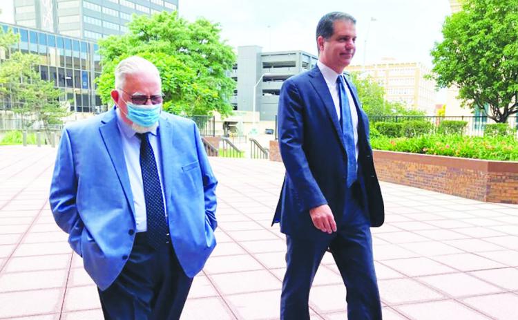 Roger Golubski, left, the former Kansas City, Kansas, Police Detective accused of sexual assault and other crimes, walks into the federal courthouse in Topeka with his attorney, Chris Joseph, in June 2023. Photo/Peggy Lowe, KCUR 89.3