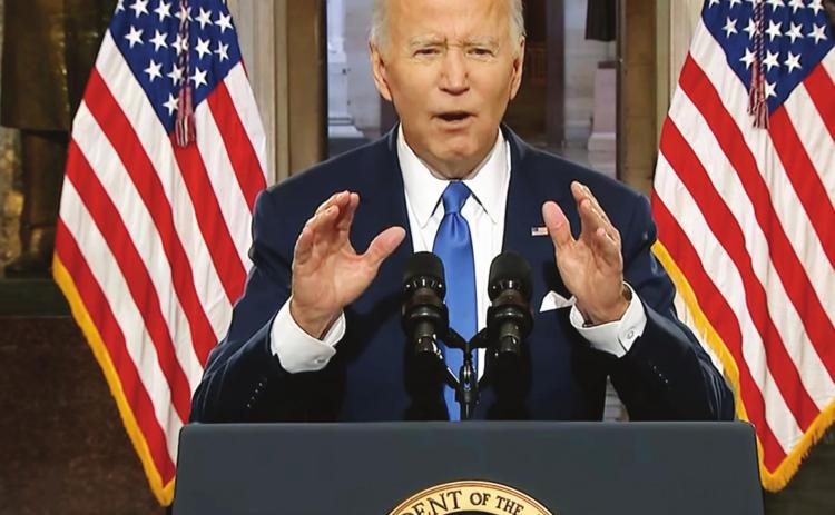 President Joe Biden speaks from Statuary Hall at the U.S. Capitol on Jan. 6, 2022, the one-year anniversary of the riot at the Capitol by supporters of former President Donald Trump,