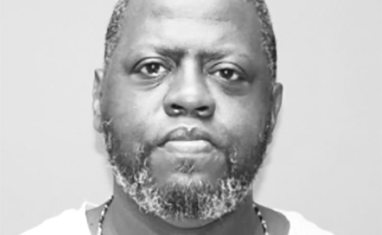 Michael Jones, 50, was convicted of first-degree murder and sentenced to a minimum of 25 years in prison for the 2015 murder of 7-year-old Adrian Jones, who was mentally and physically abused before starving to death and fed to livestock in Wyandotte County. (Screen capture/Kansas Reflector)