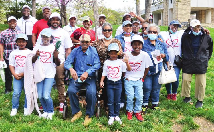 Above, members of the family of the late Harold and Mary Chaney stand near the Autumn Brilliance Serviceberry tree that was planted in their honor Saturday during the annual Arbor Day Tree Planting at at Loose Park in Kansas City, Mo. photo/Jesse Frazier, KC Parks &amp; Recreation Department