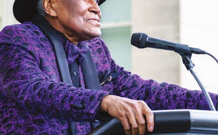 Alvin Brooks speaks to the crowd who attended a celebration on Tuesday that was planned in his honor. The event was held at the Kansas City Museum.