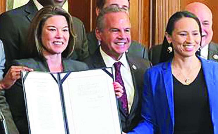 Rep. Sharice Davids at the signing of the bipartisan Respect for Marriage Act.