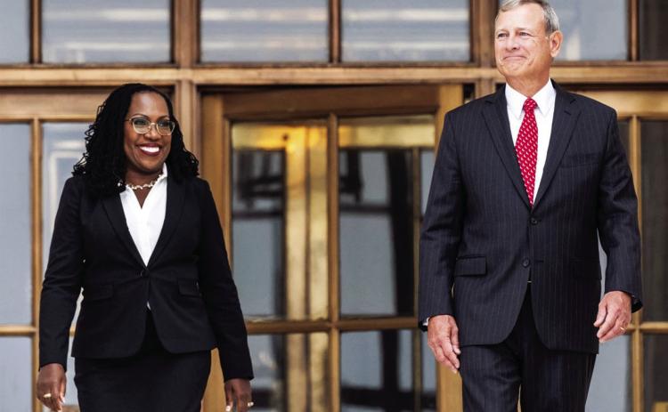 Justice Ketanji Brown Jackson and Chief Justice John Roberts walk out of the Supreme Court after her investiture ceremony last Friday. photo/Saul Loeb / AFP - Getty Images
