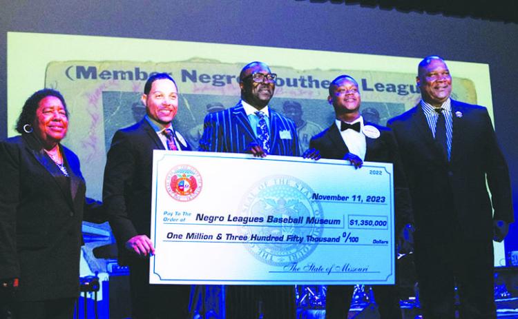 NLBM CHECK PRESENTATION FROM STATE OF MO-- From left: NLBM Board Member Betty Brown, Missouri State Representatives Mark Sharp, NLBM President Bob Kendrick, and Missouri State Representative Anthony T. Ealy Jr, NLBM Board Chairman Kevin Battle.