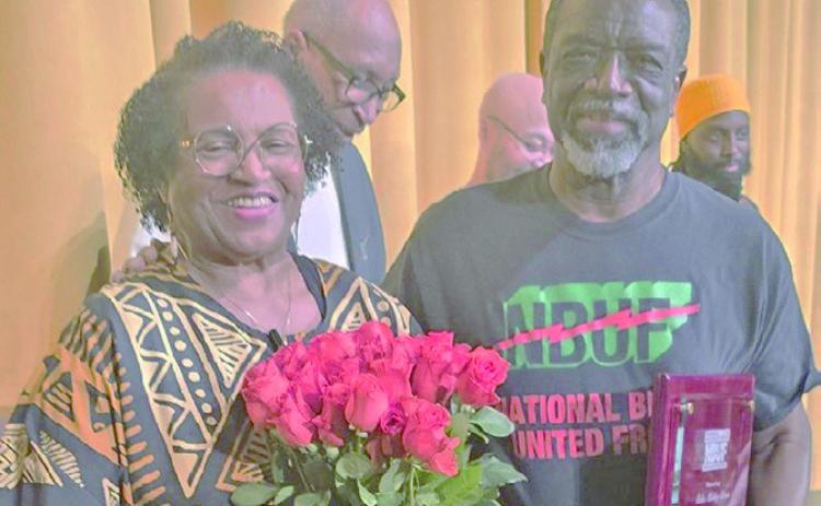 Sandra and Mickey Dean receiving awards from the National Black United Front - Kansas City for over 40 years of service to the organization.