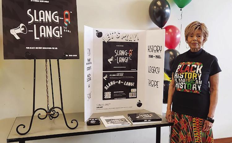 HISTORY IS AMERICAN HISTORY--Irene Carter, creator of the “Slang-A-Lang!” educational and culturally enriching game during the game’s “re-launch event” held Sunday at the Southeast Community Center in Kansas City, Mo. RELATED STORY ON PAGE 5