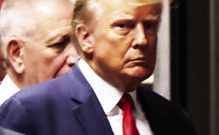 Former President Donald Trump enters the Courtroom for his arraignment on Tuesday. Courtesy photo