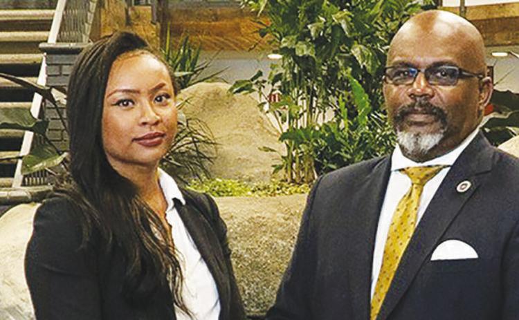 From left: Attorney Whitney Ali and her father, Att orney Zulu Ali
