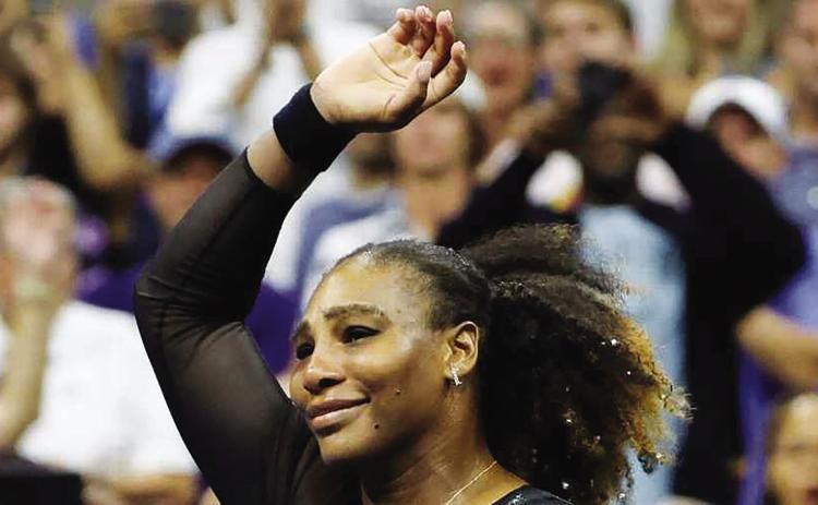 An emotional Serena Williams, 40, waves and thanks the fans following her loss in Round 3 of the US Open last Friday at Arthur Ashe Stadium in New York. She announced several weeks ago that she would “evolve” from the professional sport. ESPN reports that viewership of her final match broke records. Courtesy photo. RELATED STORY ON PAGE 2
