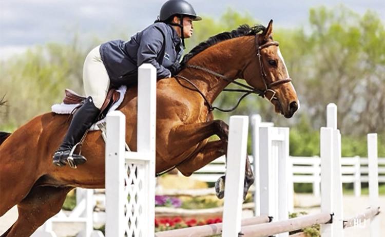 Sabrina and King Jumping 2’9” at Kansas Hunter Jumper Association’s Kingview in April 2023. photo/Haley Johnson