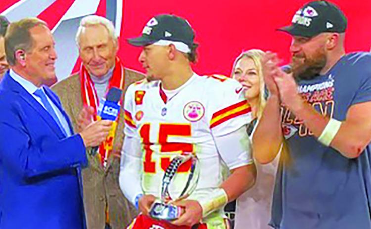 K.C. Chiefs QB Patrick Mahomes with the AFC trophy and Tight End Travis Kelce in a postgame interview following Sunday’s 17-10 win over the Ravens. screenshot photo