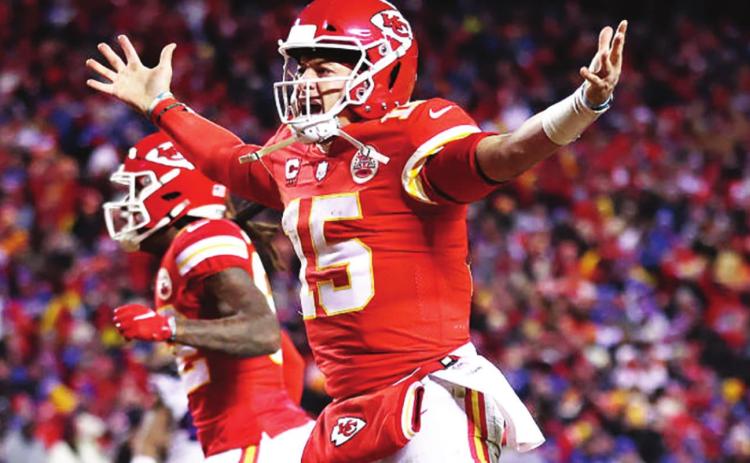 Chiefs quarterback Patrick Mahomes celebrates. After coming from behind to get in field goal range and tie the game in 13 seconds, a completed field goal in overtime ultimately sealed the Chiefs’ win. photo/getty images