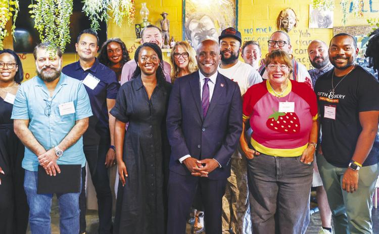 KCMO Mayor Quinton Lucas (center) with graduates of the 2025 DoorDash Accelerator for Locas Businesses in Kansas City.