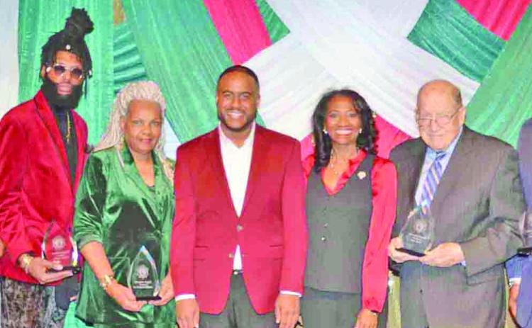 ‘Champions’ Honored At Jingle, Mingle Event