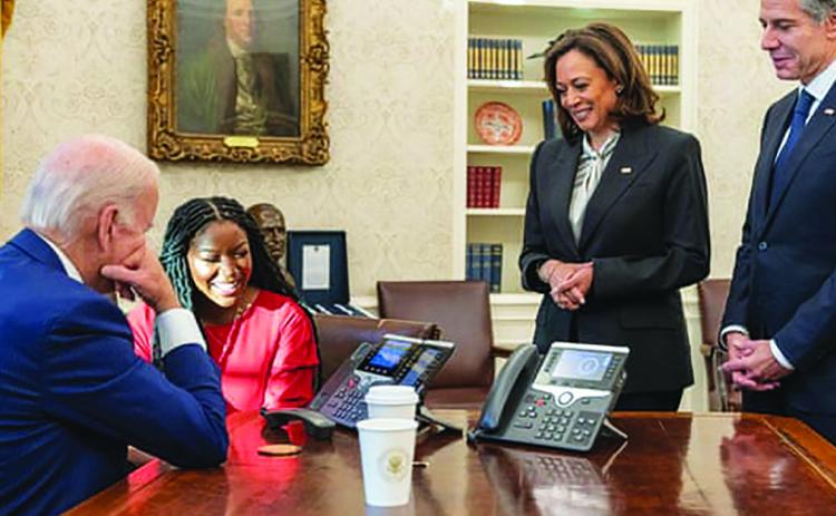 Joe Biden and Cherelle Griner speak on the phone with Brittney Griner after her release by Russia, as Vice-President Kamala Harris and the secretary of state, Antony Blinken, look on. Photo/ White House/Reuters